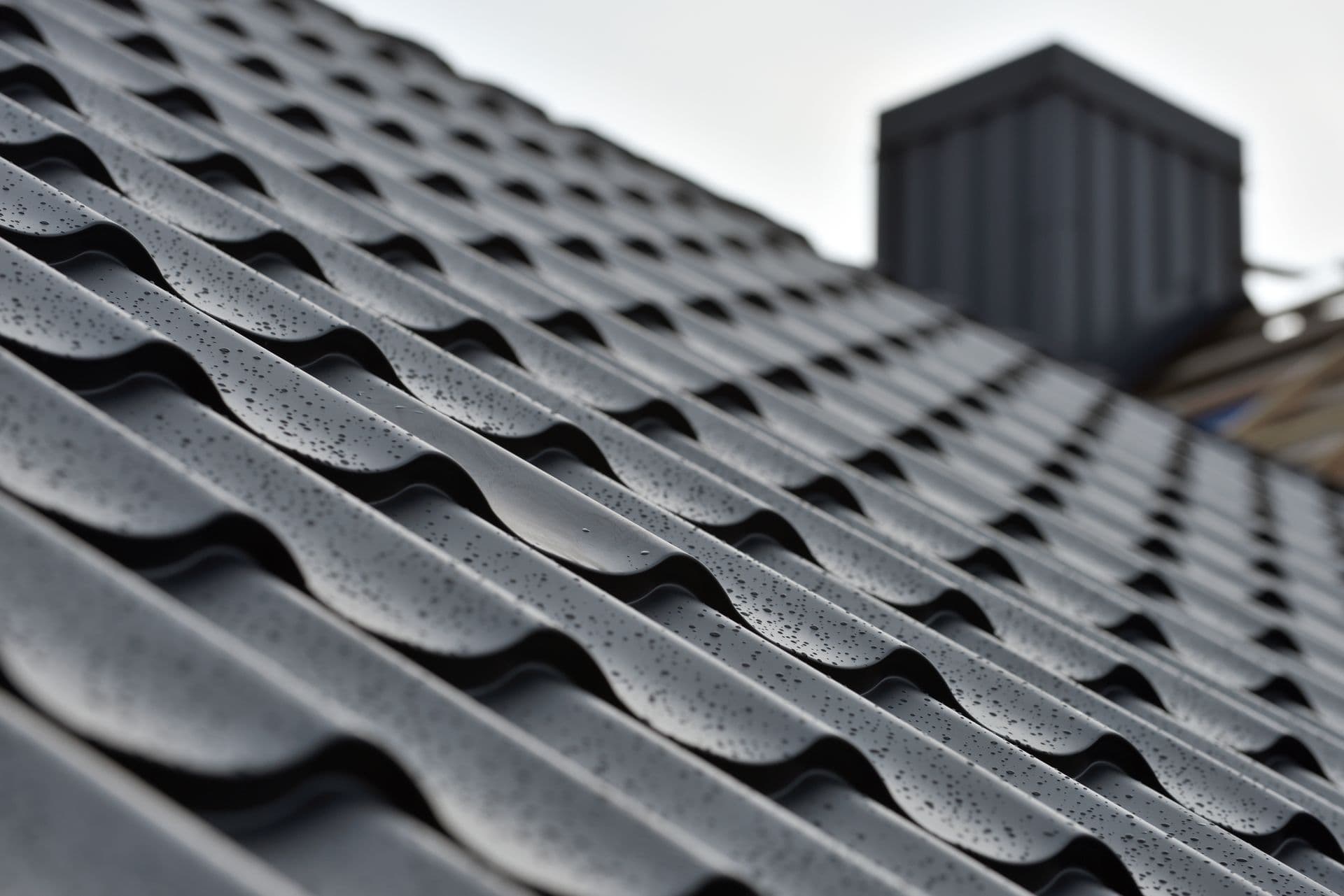 bigstock-Metal-Roof-With-Water-Drops-Af-419845396.jpg